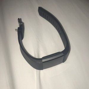 Fit bit Charge 2. Charger included.